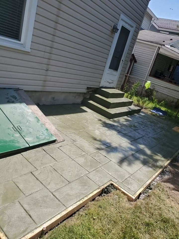 Exposed aggregate patio with smooth border band